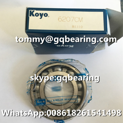 مواد الصلب Gcr15 اليابان الأصلية KOYO 6207 6207CM صف واحد عميق حفرة حلقات الكرة